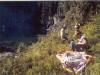 Inflating a raft and getting ready to go fishing at the lake. 