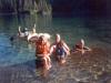 Swimming and playing in the COLD water of the lake. 