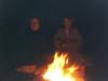 Elizabeth and Jeremiah keeping warm by the fire. 