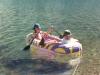 Elizabeth and Jeremiah learning how to paddle a raft. 
