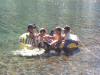 All the kids in the raft. 