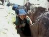 Elizabeth climbing up a hard spot. 